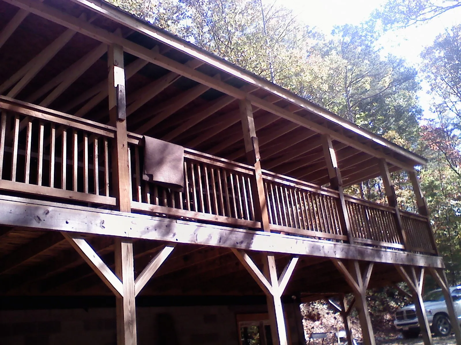 Timber framing under a new elevated porch and deck — Roof Leak Repair in Shapleigh by Roofing Brothers